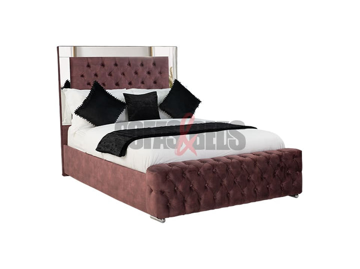 Velvet upholstered bed in burgundy by Sofas & Beds Limited