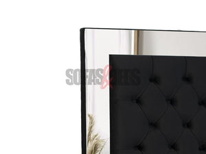 Velvet upholstered bed in black by Sofas & Beds Limited